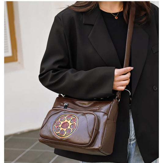 Vintage skuldertaske med relieff og stor kapacitet